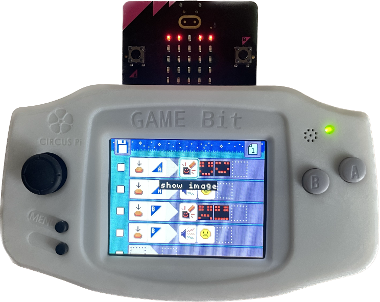 The BBC micro:bit slotted into an Arcade shield, which has a small color screen and extra inputs.